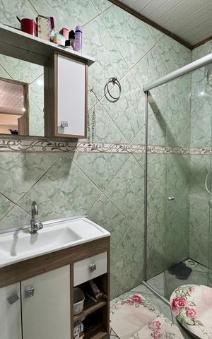 Casa à venda com 80m², 1 quarto e 2 vagasBanheiro