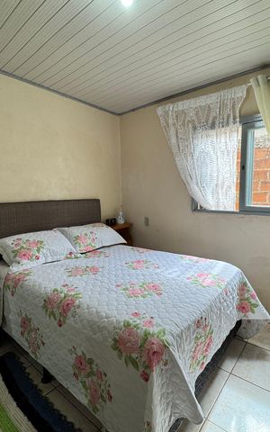 Casa à venda com 80m², 1 quarto e 2 vagasQuarto 1