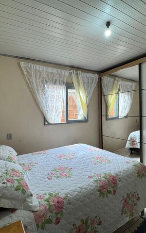 Casa à venda com 80m², 1 quarto e 2 vagasQuarto 1