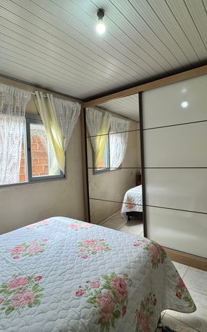 Casa à venda com 80m², 1 quarto e 2 vagasQuarto 1
