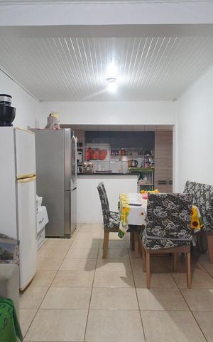 Casa à venda com 90m², 3 quartos e 2 vagasSala