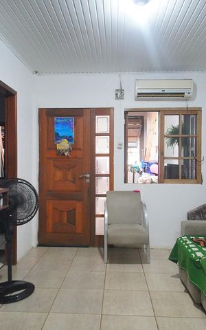 Casa à venda com 90m², 3 quartos e 2 vagasSala