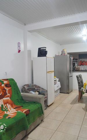 Casa à venda com 90m², 3 quartos e 2 vagasSala