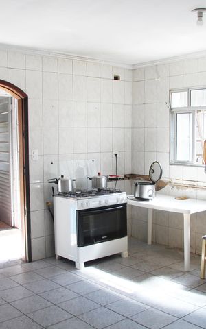 Casa à venda com 287m², 4 quartos e 2 vagasCasa 1 Cozinha