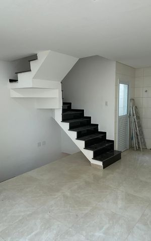 Casa à venda com 85m², 2 quartos e 2 vagas Casa à venda com 85m², 2 quartos e 2 vagasCozinha