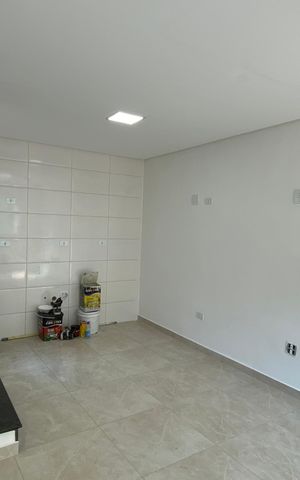 Casa à venda com 85m², 2 quartos e 2 vagas Casa à venda com 85m², 2 quartos e 2 vagasCozinha