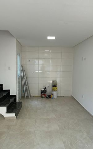 Casa à venda com 85m², 2 quartos e 2 vagas Casa à venda com 85m², 2 quartos e 2 vagasCozinha