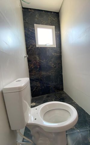 Casa para alugar com 130m², 2 quartos e 4 vagas Casa para alugar com 130m², 2 quartos e 4 vagasBanheiro da Suíte 2