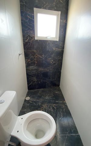 Casa para alugar com 130m², 2 quartos e 4 vagas Casa para alugar com 130m², 2 quartos e 4 vagasBanheiro da Suíte 2