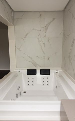 Casa de condomínio à venda com 209m², 3 quartos e 2 vagas Casa de condomínio à venda com 209m², 3 quartos e 2 vagasBanheiro da Suíte 1