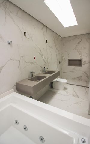 Casa de condomínio à venda com 209m², 3 quartos e 2 vagas Casa de condomínio à venda com 209m², 3 quartos e 2 vagasBanheiro da Suíte 1