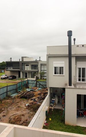 Casa de condomínio à venda com 209m², 3 quartos e 2 vagas Casa de condomínio à venda com 209m², 3 quartos e 2 vagasVista da Suíte 2
