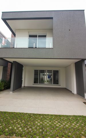 Casa de condomínio à venda com 209m², 3 quartos e 2 vagas Casa de condomínio à venda com 209m², 3 quartos e 2 vagasFachada