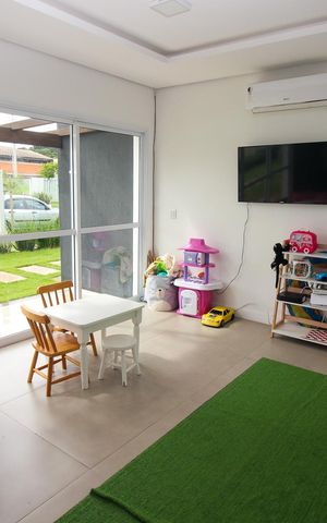 Casa de condomínio à venda com 209m², 3 quartos e 2 vagas Casa de condomínio à venda com 209m², 3 quartos e 2 vagasBrinquedoteca