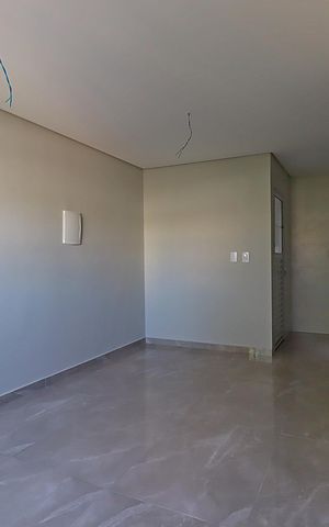 Casa à venda com 100m², 2 quartos e 2 vagasSala