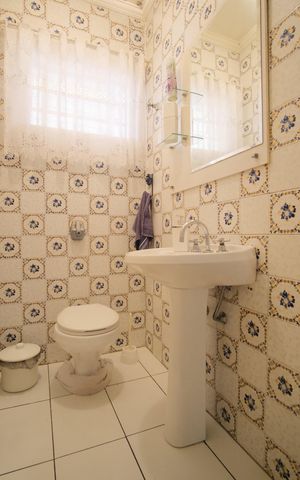 Casa à venda com 255m², 4 quartos e 2 vagasLavabo