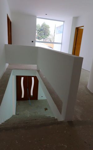 Casa à venda com 258m², 4 quartos e 4 vagasCorredor