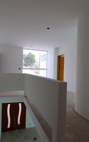 Casa à venda com 258m², 4 quartos e 4 vagasCorredor