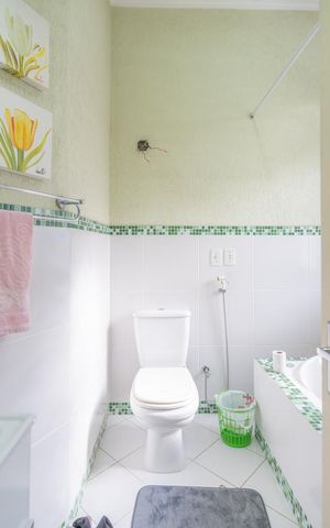 Casa à venda com 320m², 4 quartos e 1 vaga Casa à venda com 320m², 4 quartos e 1 vagaBanheiro da Suíte