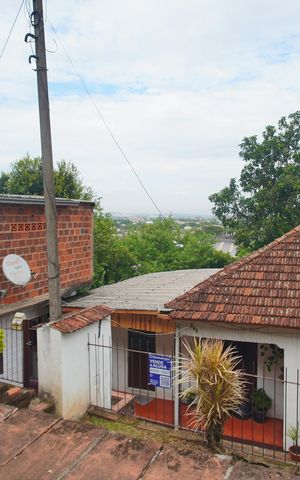 Casa à venda com 80m², 2 quartos e 1 vagaFachada/ Placa