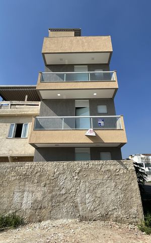 Apartamento para alugar com 50m², 2 quartos e sem vagaFachada + plaquinha