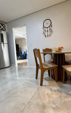 Casa à venda com 118m², 2 quartos e 2 vagas Casa à venda com 118m², 2 quartos e 2 vagasCozinha
