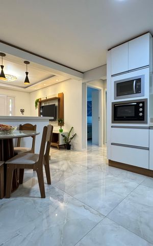 Casa à venda com 118m², 2 quartos e 2 vagas Casa à venda com 118m², 2 quartos e 2 vagasCozinha