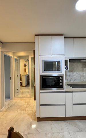 Casa à venda com 118m², 2 quartos e 2 vagas Casa à venda com 118m², 2 quartos e 2 vagasCozinha