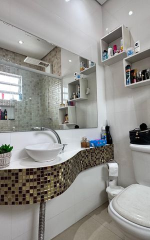Casa à venda com 118m², 2 quartos e 2 vagas Casa à venda com 118m², 2 quartos e 2 vagasBanheiro da Suíte
