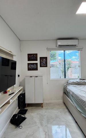 Casa à venda com 118m², 2 quartos e 2 vagas Casa à venda com 118m², 2 quartos e 2 vagasQuarto