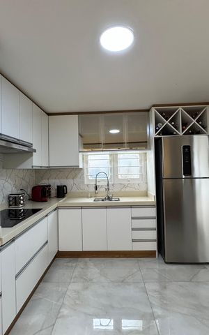 Casa à venda com 118m², 2 quartos e 2 vagas Casa à venda com 118m², 2 quartos e 2 vagasCozinha