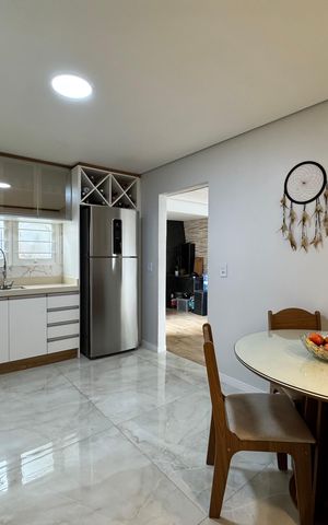 Casa à venda com 118m², 2 quartos e 2 vagas Casa à venda com 118m², 2 quartos e 2 vagasCozinha