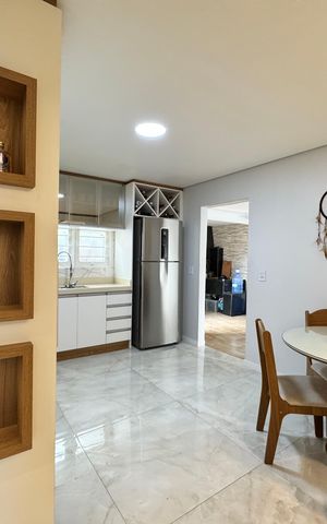 Casa à venda com 118m², 2 quartos e 2 vagas Casa à venda com 118m², 2 quartos e 2 vagasCozinha