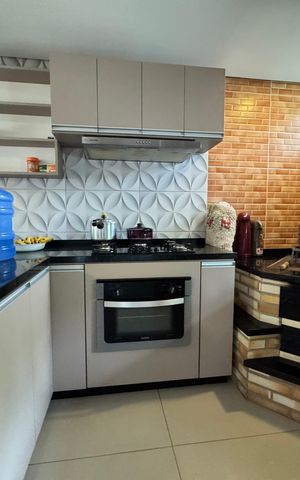 Casa à venda com 150m², 4 quartos e 1 vaga Casa à venda com 150m², 4 quartos e 1 vagaCozinha - Fogão à lenha