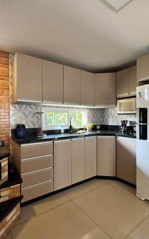 Casa à venda com 150m², 4 quartos e 1 vaga Casa à venda com 150m², 4 quartos e 1 vagaCozinha - Fogão à lenha