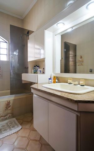 Casa à venda com 453m², 4 quartos e 3 vagasBanheiro
