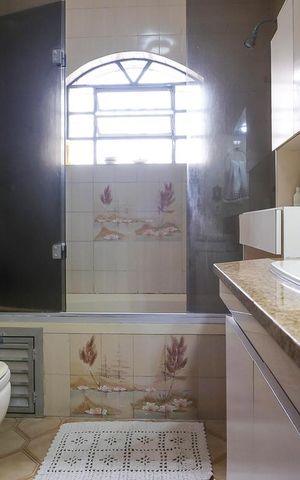 Casa à venda com 453m², 4 quartos e 3 vagasBanheiro