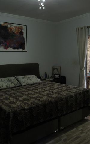 Casa à venda com 242m², 4 quartos e 4 vagasQuarto 4/ Suíte