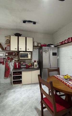 Casa de condomínio à venda com 300m², 4 quartos e 3 vagas Casa de condomínio à venda com 300m², 4 quartos e 3 vagasCozinha