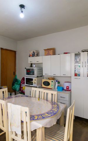 Casa à venda com 175m², 4 quartos e 2 vagas Casa à venda com 175m², 4 quartos e 2 vagasCozinha