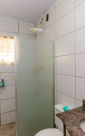 Casa à venda com 175m², 4 quartos e 2 vagas Casa à venda com 175m², 4 quartos e 2 vagasBanheiro