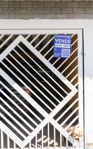 Casa à venda com 125m², 3 quartos e 2 vagasFachada + Plaquinha