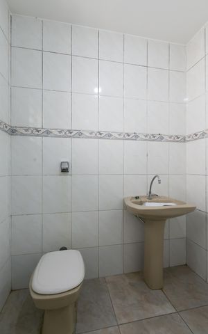 Casa à venda com 314m², 6 quartos e 7 vagasBanheiro 1
