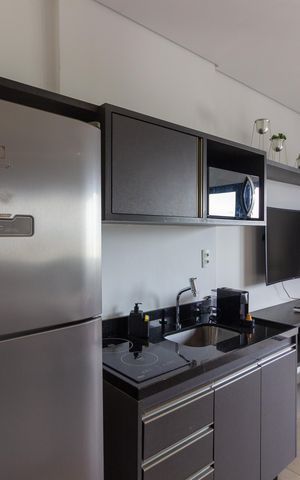 Studio para alugar com 32m², 1 quarto e 1 vaga Studio para alugar com 32m², 1 quarto e 1 vagaCozinha
