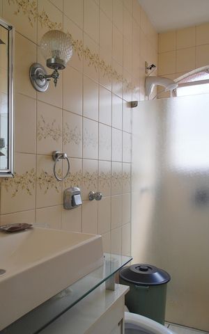 Casa à venda com 320m², 4 quartos e 5 vagasBanheiro da Suíte