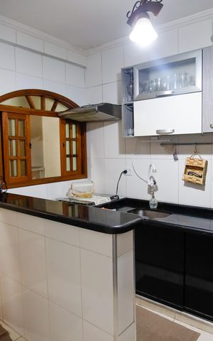 Casa à venda com 125m², 2 quartos e 3 vagas Casa à venda com 125m², 2 quartos e 3 vagasCozinha