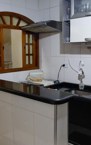 Casa à venda com 125m², 2 quartos e 3 vagas Casa à venda com 125m², 2 quartos e 3 vagasCozinha