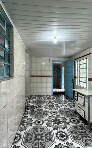 Casa à venda com 136m², 3 quartos e 2 vagas Casa à venda com 136m², 3 quartos e 2 vagasCozinha