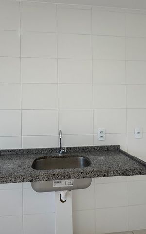 Apartamento à venda com 45m², 2 quartos e 1 vaga Apartamento à venda com 45m², 2 quartos e 1 vagaCozinha e Área de Serviço
