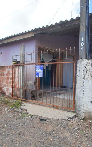 Casa à venda com 60m², 2 quartos e 1 vagaFachada + Plaquinha 